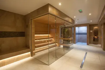 a glass walk in shower in a room at Netherwood Hotel & Spa in Grange Over Sands