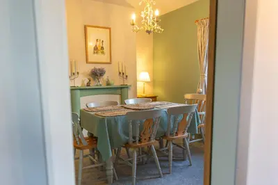 a dining room with a table and chairs at The Lower Buck Inn in Clitheroe