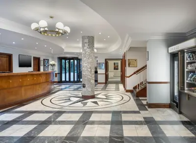 a lobby with a spiral design on the floor at Delta Hotels by Marriott Liverpool City Centre in Liverpool