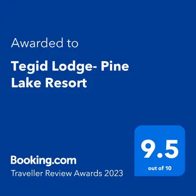a screenshot of a texted lodge pine lake resort with the text awarded to treed at Tegid Lodge- Pine Lake Resort in Carnforth