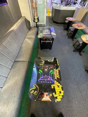 a video game console sitting on a couch at Clifton Private Hotel in Blackpool