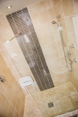 a bathroom with a shower with a glass door at Park House Hotel in Blackpool