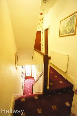 a staircase in a house with a stairway at Fairhaven Holiday Flats in Blackpool