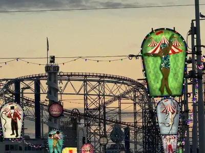a roller coaster in front of a roller coaster at Fairhaven Holiday Flats in Blackpool