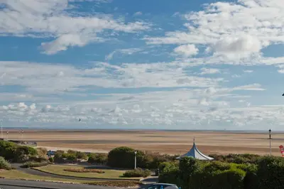 a tent and a beach with a field of sand at St Ives Hotel in Lytham St Annes