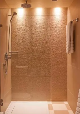a shower with a glass door in a bathroom at Spa Hotel at Ribby Hall Village in Wrea Green