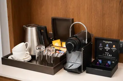 a coffee maker on a counter in a hotel room at Spa Hotel at Ribby Hall Village in Wrea Green