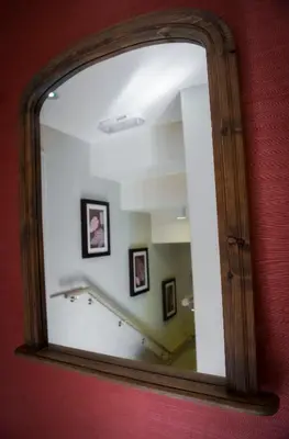 a mirror reflection of a staircase in a room at Wagon & Horses in Lancaster