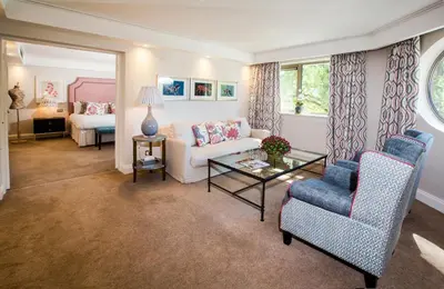 a living room with a couch and a table at Wrightington Hotel, Health Club & Spa in Wigan