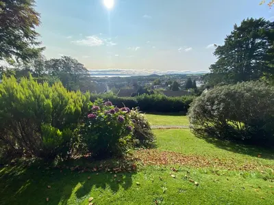 a garden with a view of the countryside at The Stables, Ulverston in Ulverston