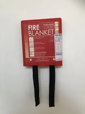 a fire hazard sign on a white wall at Beach House - Penthouse 3 Bed Apartment in Southport