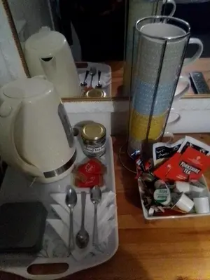 a kitchen counter with a blender andtools on a table at The braeside families and couples in Blackpool