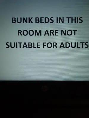 a sign that says bump beds in this room are not suitable for adults at The braeside families and couples in Blackpool