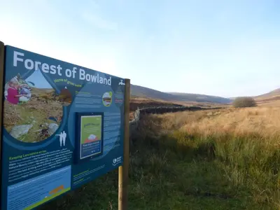a sign for the forest of bowland in a field at Deer Lodge in Blackburn