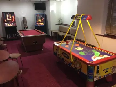 a room with a pool table and a game table at Danescourt Lodge in Blackpool