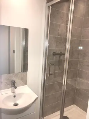 a bathroom with a shower and a sink at Winter Gardens Service Apartments by Blackpool Service Apartments in Blackpool