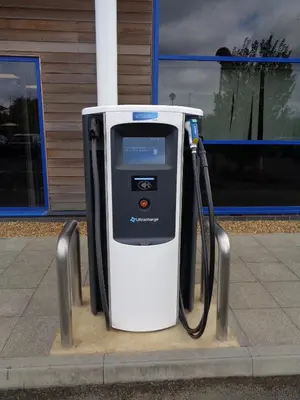 a pay phone sitting on the side of a street at Holiday Inn Express Preston South by IHG in Preston