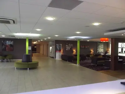 a lobby of a hospital with a waiting room at Holiday Inn Express Preston South by IHG in Preston