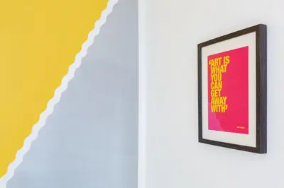 a picture frame hanging on a wall next to a wall at Comfortable Liverpool Townhouse - Close to City & Stadium in Liverpool