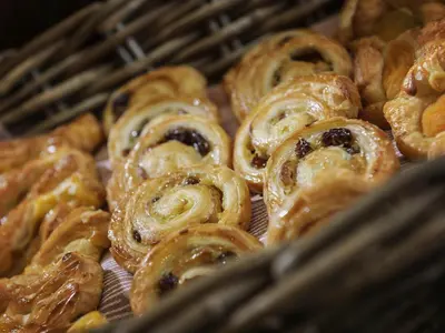 a bunch of pastries sitting in a basket at ibis Liverpool Centre Albert Dock – Liverpool One in Liverpool