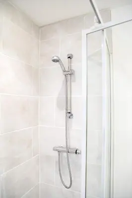 a shower with a glass door in a bathroom at Ropewalks Apartments by Happy Days in Liverpool