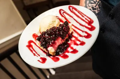 a plate with a dessert with a scoop of ice cream at Royal Oak Hotel, Garstang in Garstang