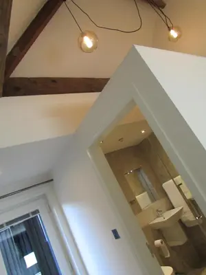 a bathroom with a sink and a mirror at Willow Lodge Hambleton in Poulton le Fylde