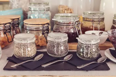 a table with jars and spoons on a table at The New Inn in Carnforth