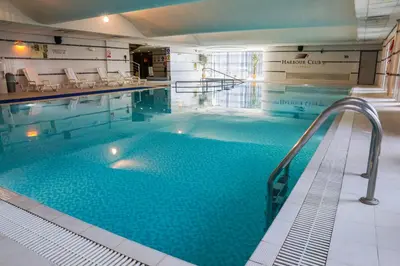 a large swimming pool in a hotel room at Crowne Plaza Liverpool City Centre by IHG in Liverpool