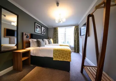 a hotel room with a bed and a large window at All Bar One by Innkeeper's Collection in Liverpool