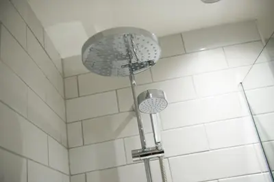 a shower with two lights in a bathroom at All Bar One by Innkeeper's Collection in Liverpool