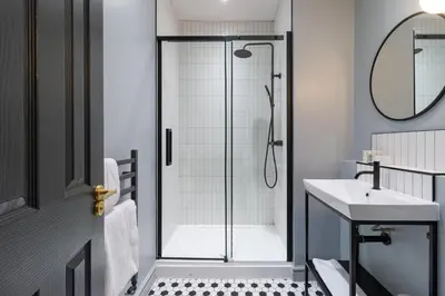 a bathroom with a shower and a sink at Hy Lytham St Anne's in Lytham St Annes