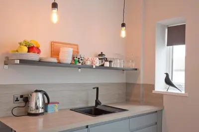 a kitchen with a sink and a counter top at Blackbird Luxury Apartments Room 3 in Blackpool