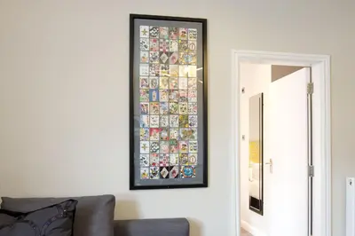 a picture hanging on a wall in a living room at Blackbird Luxury Apartments Room 2 in Blackpool
