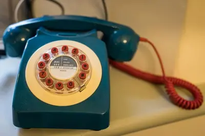 a blue telephone is sitting on a table at Woodhaven - Luxury 4 bedroom rural retreat with hot tub near to Lake District in Grange Over Sands