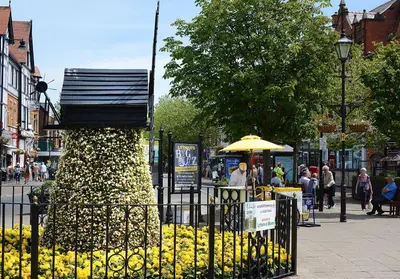 a pole with a sign on top of it next to a fence at Pippin Lodge Lytham in Lytham St Annes