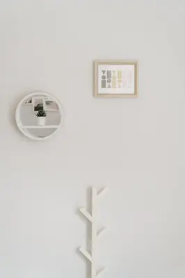 a white room with a window and a plant at Design Suites Lytham in Lytham St Annes