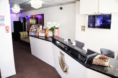 a food counter in a restaurant with a table at Stuart hotel in Blackpool