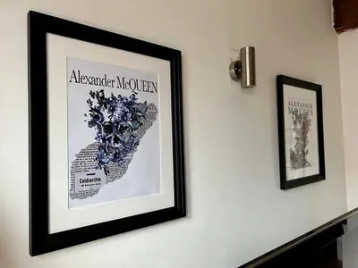 a framed picture of a map on a wall at 2 Bed Duplex Penthouse Apartment by Mathew Street Sleeps 6 in Liverpool
