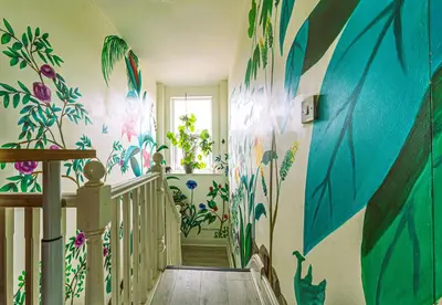 a hallway with flowers painted on the walls at Botanic Rooms in Liverpool