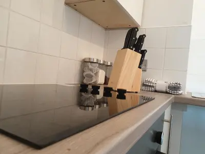 a kitchen counter with a knife block on it at Shandon Apt premium Liverpool City Centre in Liverpool