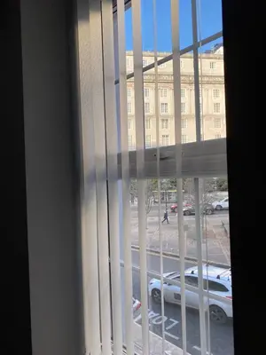 a window with a view of a parking lot at Brownlows Inn Rooms formerly Riley's Rooms in Liverpool