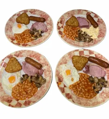 a group of four plates of food with eggs and beans at Fairhaven Hotel on Woodfield Road in Blackpool
