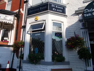 a store front with a window on a street at Delamere Hotel in Blackpool