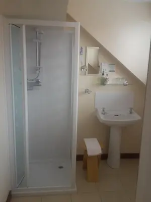 a bathroom with a shower and a sink at The Breverton in Lytham St Annes