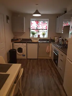 a kitchen with a sink and a dishwasher at Liverpool Anfield in Liverpool