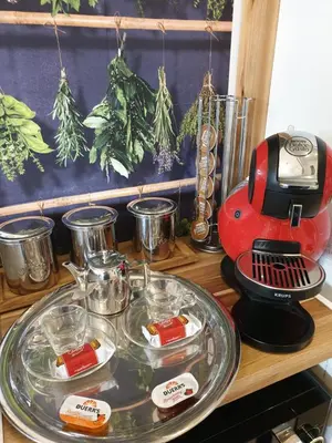 a red mixer sitting on top of a wooden table at Luxury 5* Home with Secret Garden and Free Parking in Liverpool