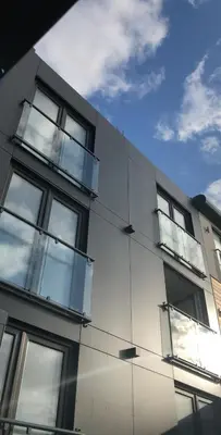 a white building with windows on the side of it at ApartHotel421 by Seafront Collection in Blackpool