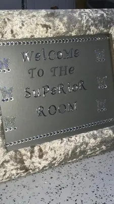 a sign that says welcome to the superior room at Sorrento House in Blackpool