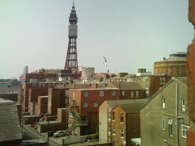a view of a city with a tower in the background at Arlingtons in Blackpool